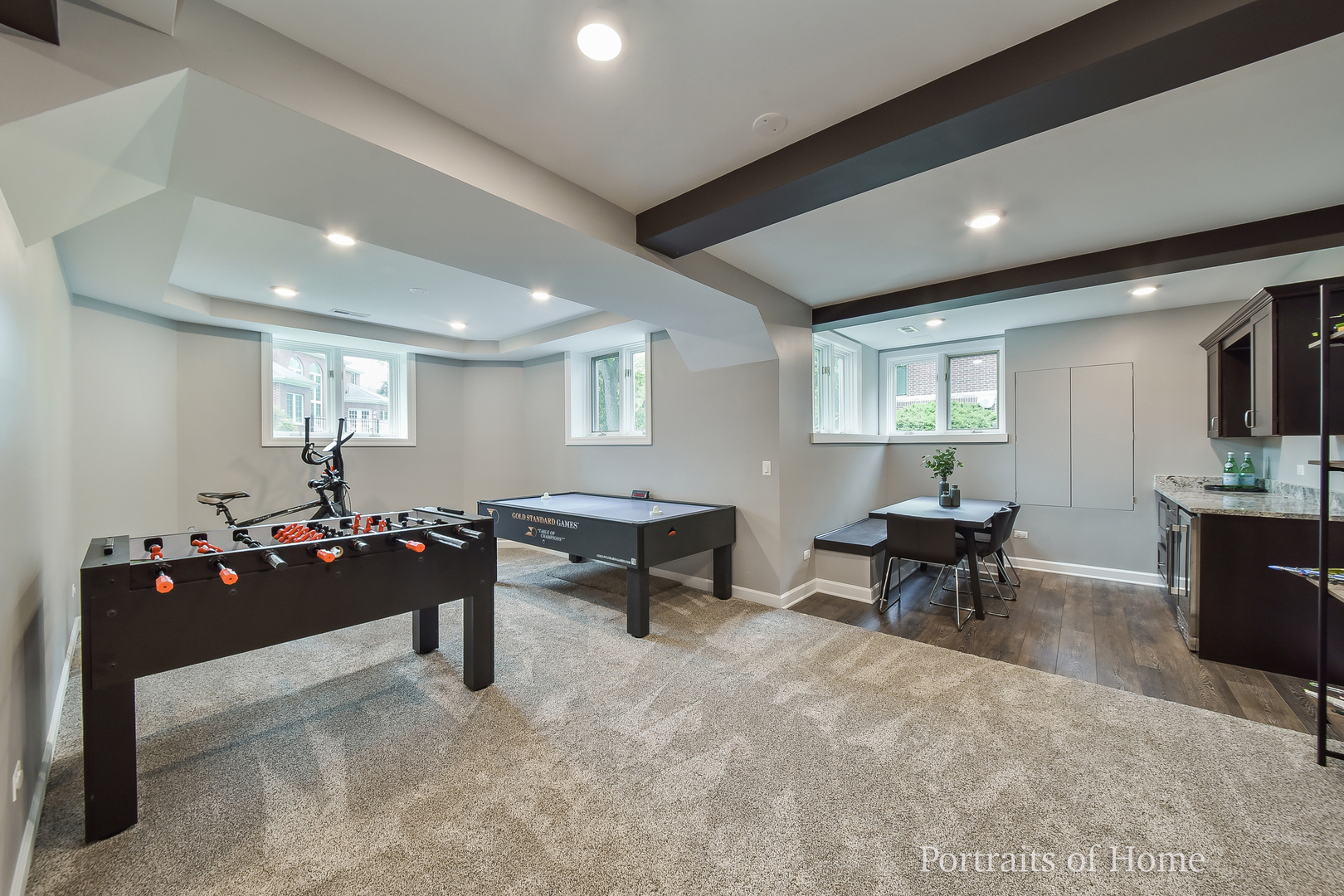 3721 Red Oak Lane Lisle, IL 60532 - Photo 28 of 35 a living room with furniture gym equipment and a flat screen tv