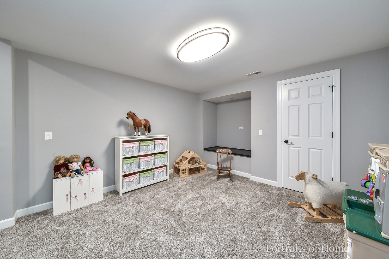 3721 Red Oak Lane Lisle, IL 60532 - Photo 30 of 35 a view of a livingroom with furniture and toys
