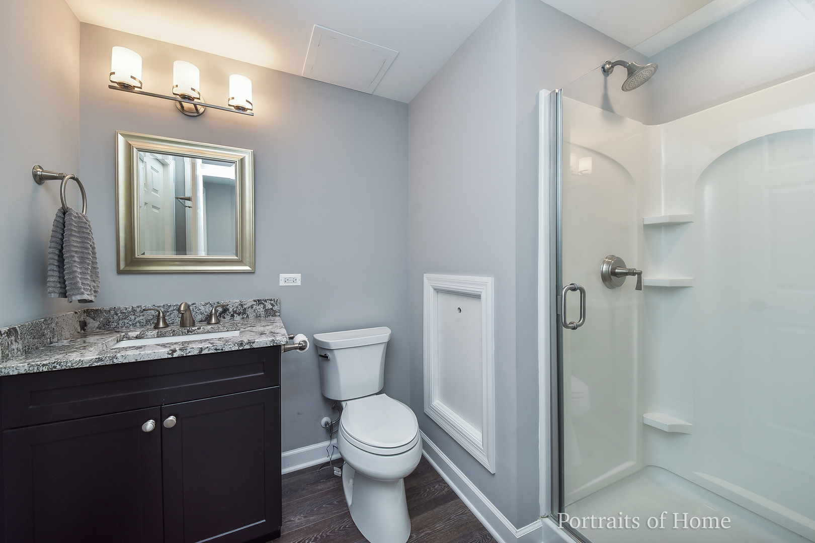 3721 Red Oak Lane Lisle, IL 60532 - Photo 33 of 35 a bathroom with a toilet sink and mirror