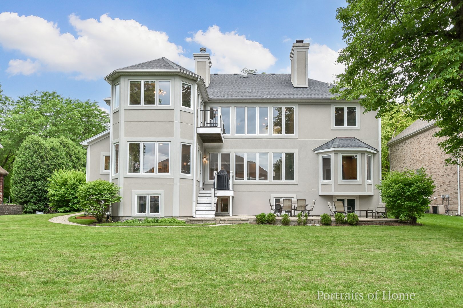 3721 Red Oak Lane Lisle, IL 60532 - Photo 35 of 35 a front view of a house with a garden