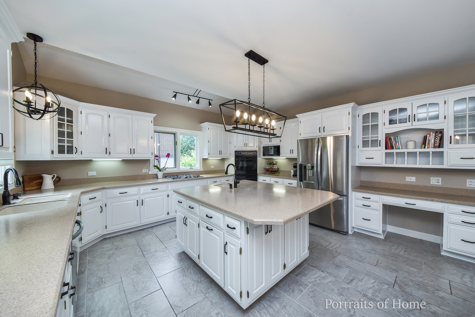 3721 Red Oak Lane Lisle, IL 60532 - Photo 7 of 35 a kitchen with stainless steel appliances a sink stove and refrigerator