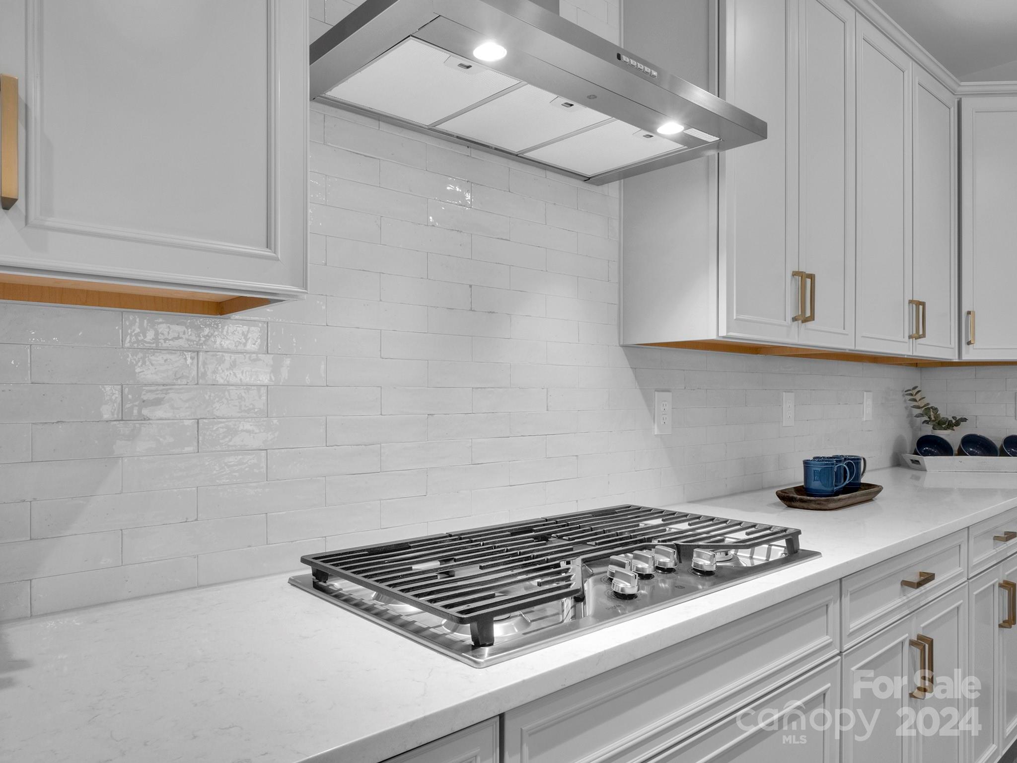 4011 Charlton Road Fort Mill, SC 29715 - Photo 17 of 48 a stove top oven sitting inside of a kitchen