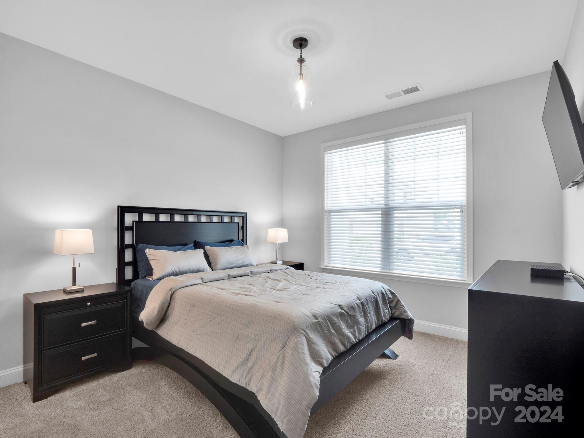 4011 Charlton Road Fort Mill, SC 29715 - Photo 20 of 48 a bedroom with bed and a window