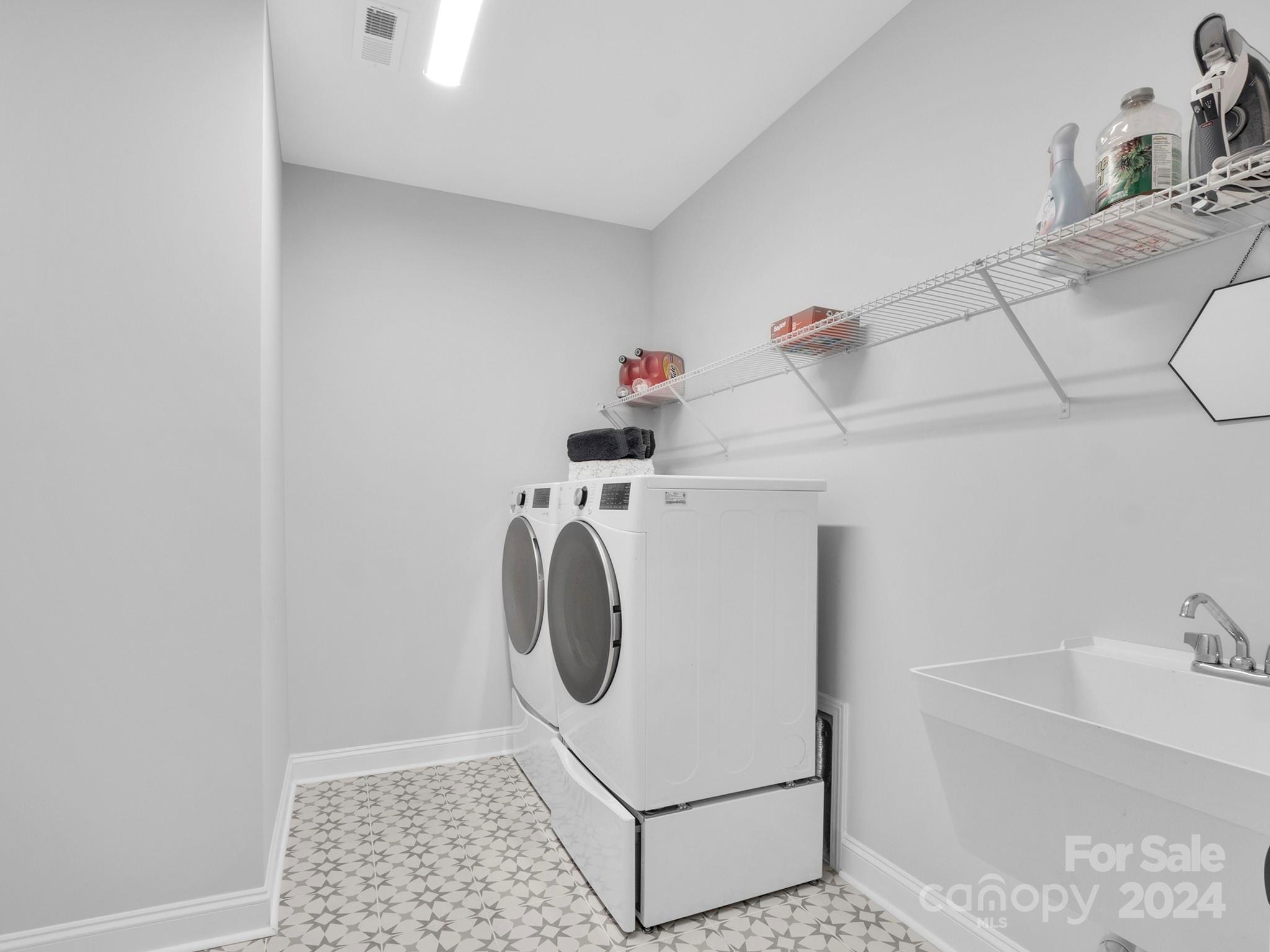 4011 Charlton Road Fort Mill, SC 29715 - Photo 25 of 48 a utility room with dryer and washer