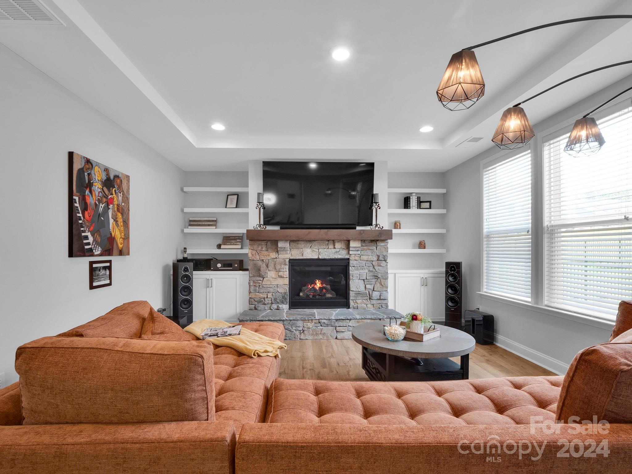 4011 Charlton Road Fort Mill, SC 29715 - Photo 27 of 48 a living room with furniture fireplace and a large window