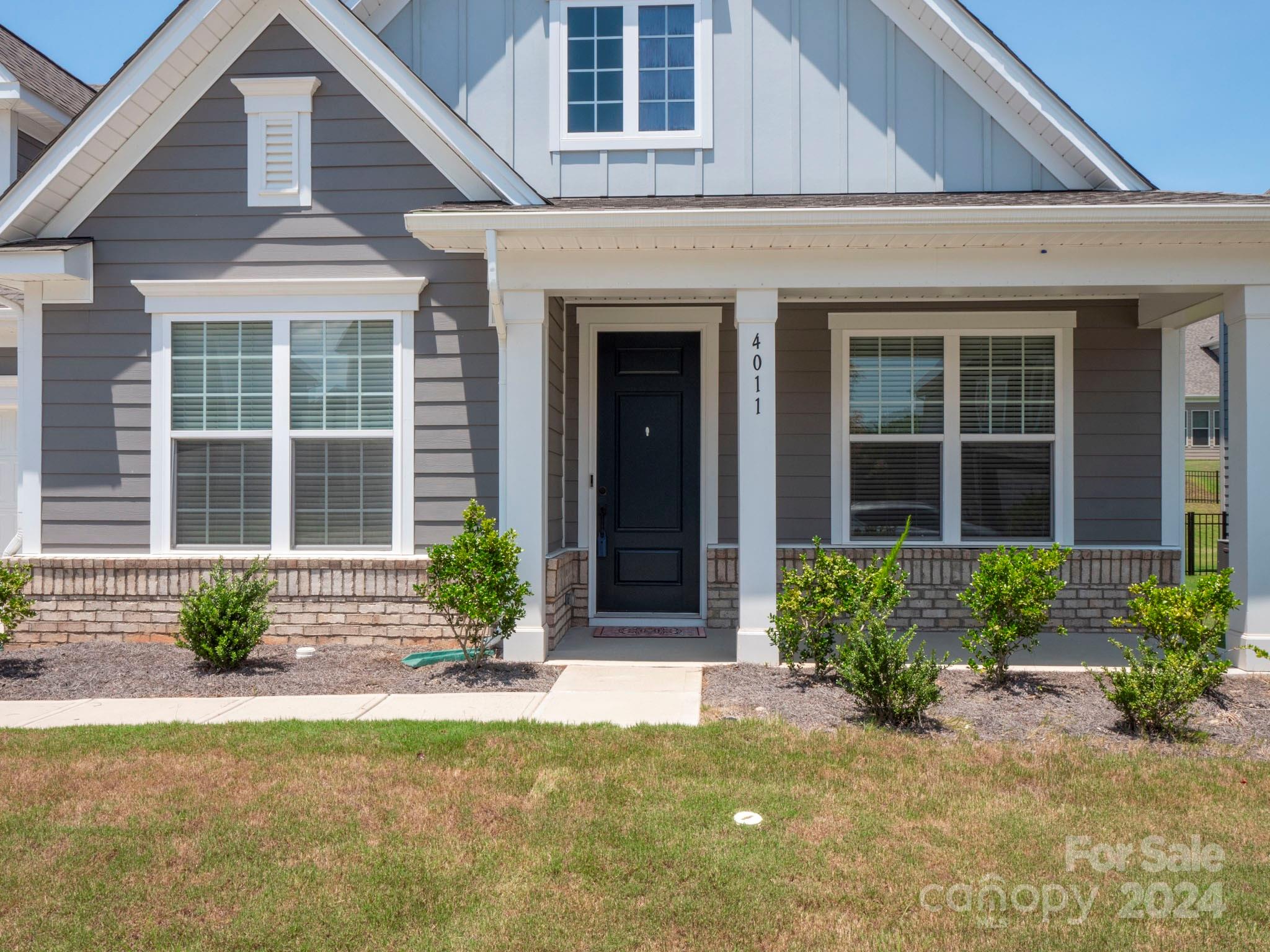 4011 Charlton Road Fort Mill, SC 29715 - Photo 3 of 48 a view of a house with potted plants