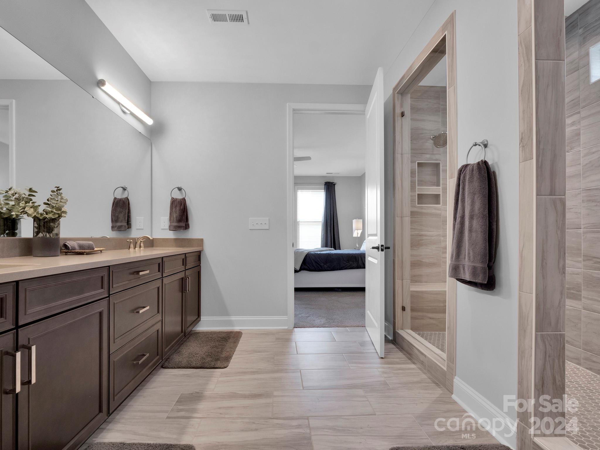 4011 Charlton Road Fort Mill, SC 29715 - Photo 37 of 48 a bathroom with a sink and mirror