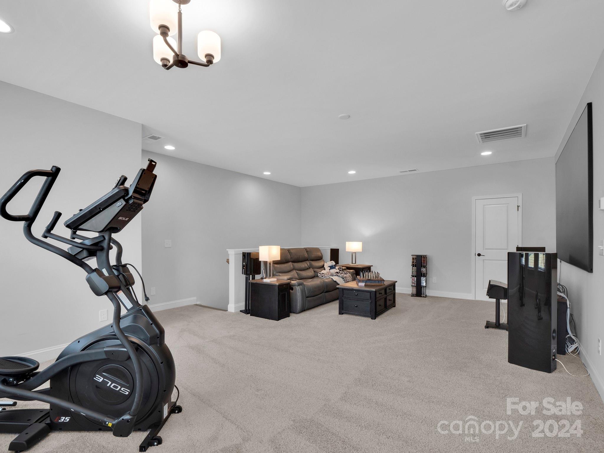 4011 Charlton Road Fort Mill, SC 29715 - Photo 39 of 48 a view of a room with gym equipment
