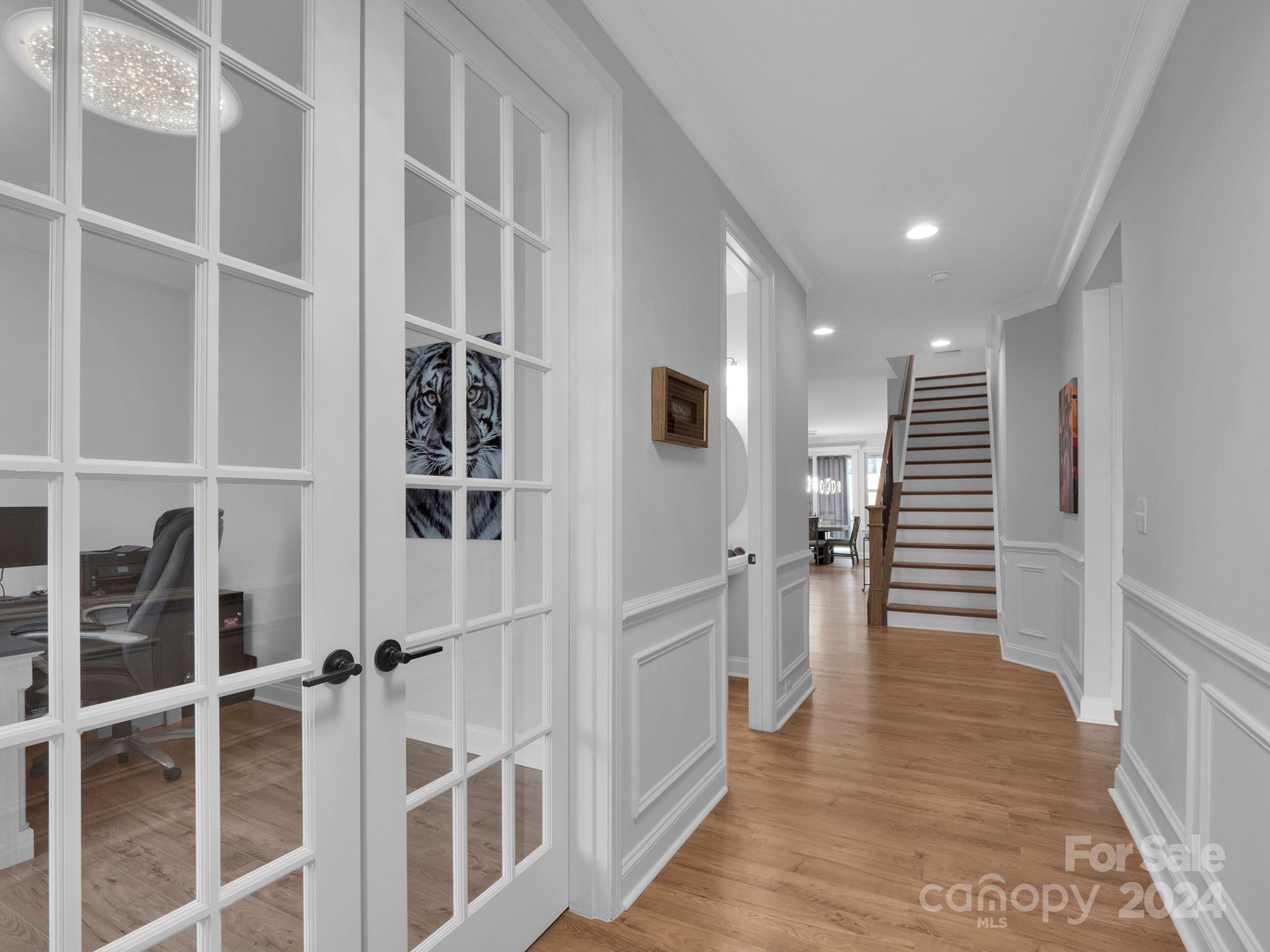 4011 Charlton Road Fort Mill, SC 29715 - Photo 5 of 48 a view of entryway with stairs and wooden floor