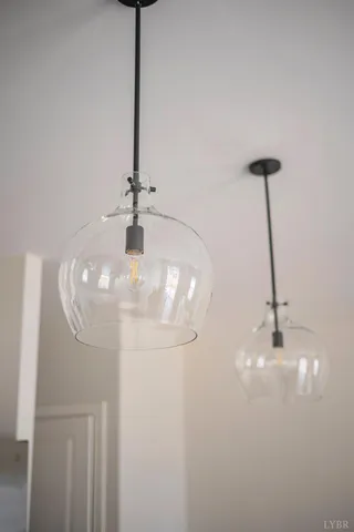 a room with furniture and a potted plant