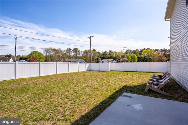a view of a yard with an outdoor space