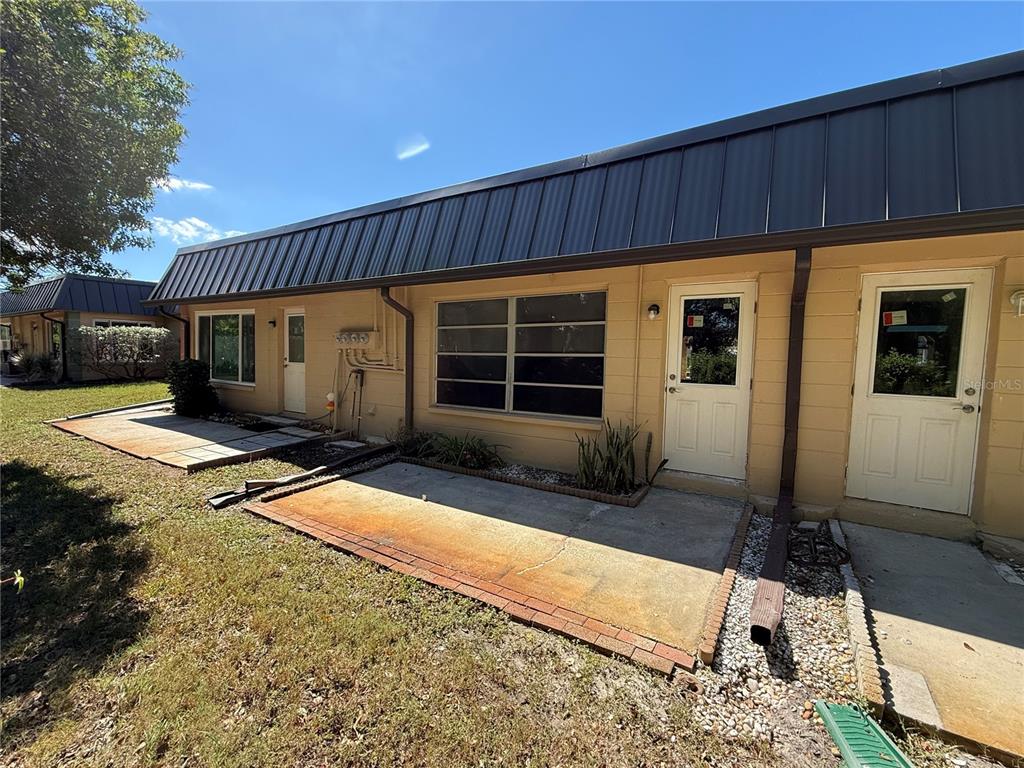 4408 Sunstate Drive New Port Richey, FL 34652 - Photo 18 of 31 a front view of a house having yard