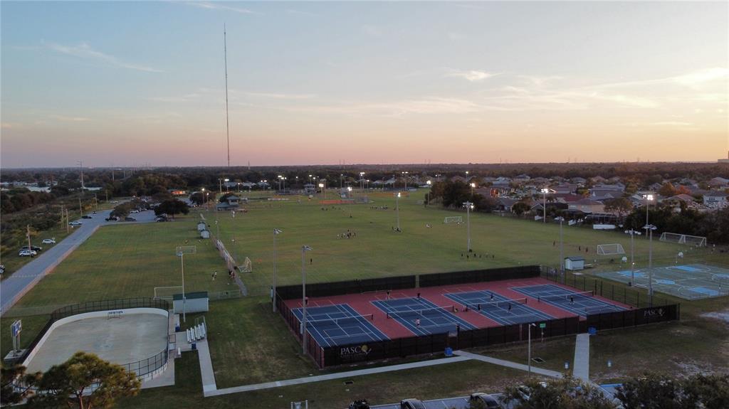 4408 Sunstate Drive New Port Richey, FL 34652 - Photo 31 of 31 an aerial view of a houses with a lake view