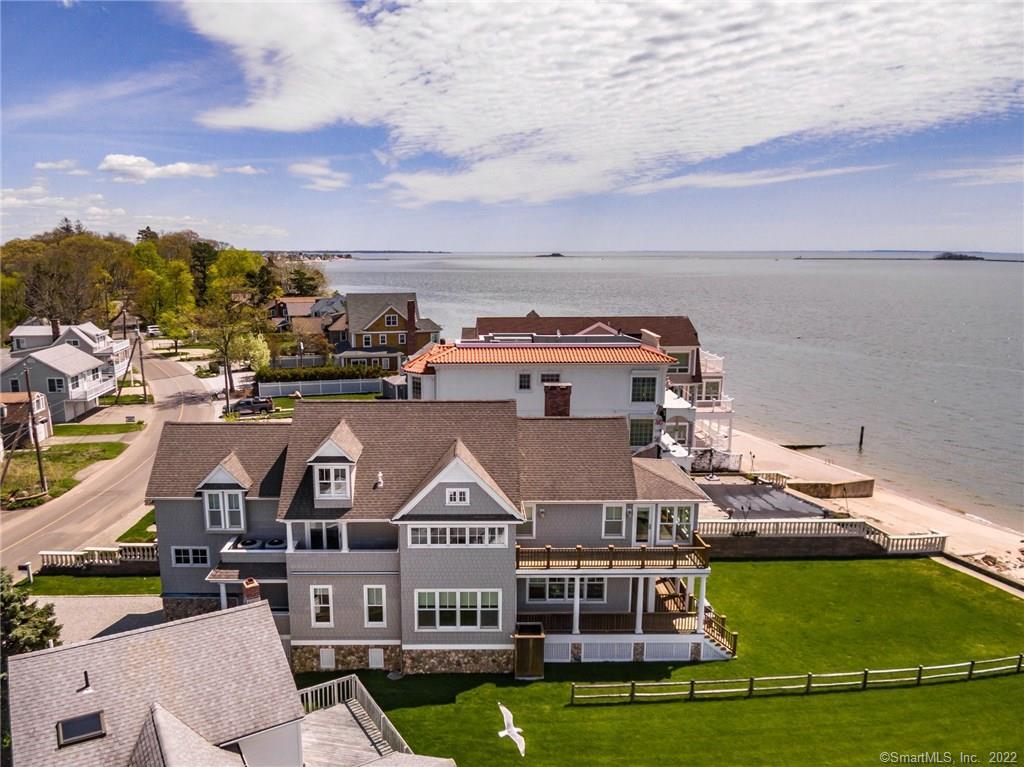 Grace and classic styling and carefree exterior siding of "Hardie" cement shingles