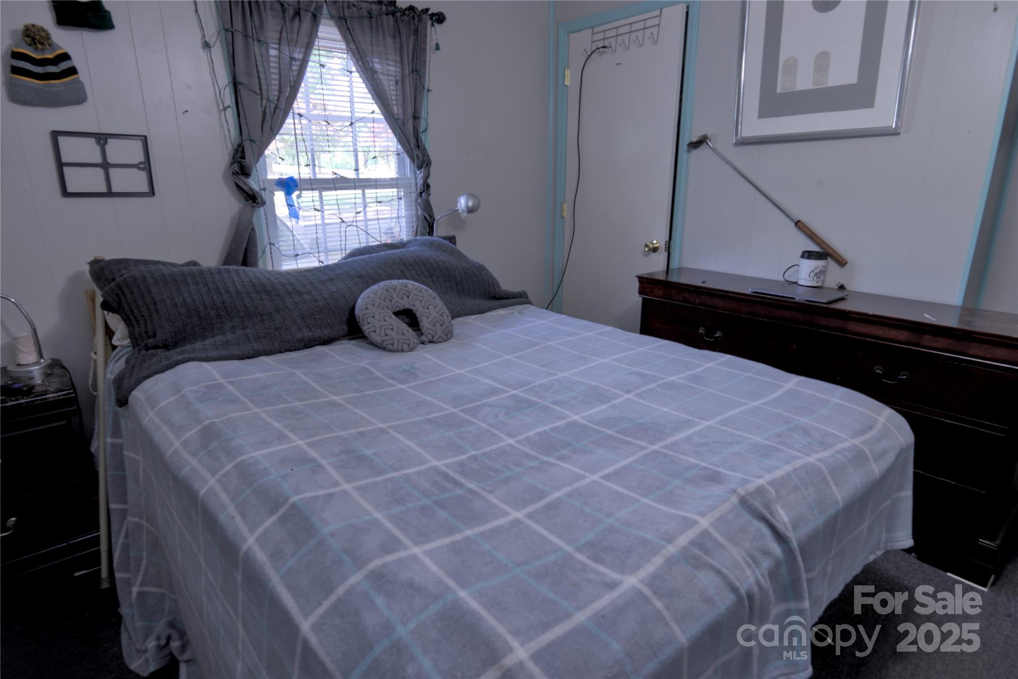 515 Upper Spencer Mountain Road Stanley, NC 28164 - Photo 14 of 24 a bedroom with a bed and a window