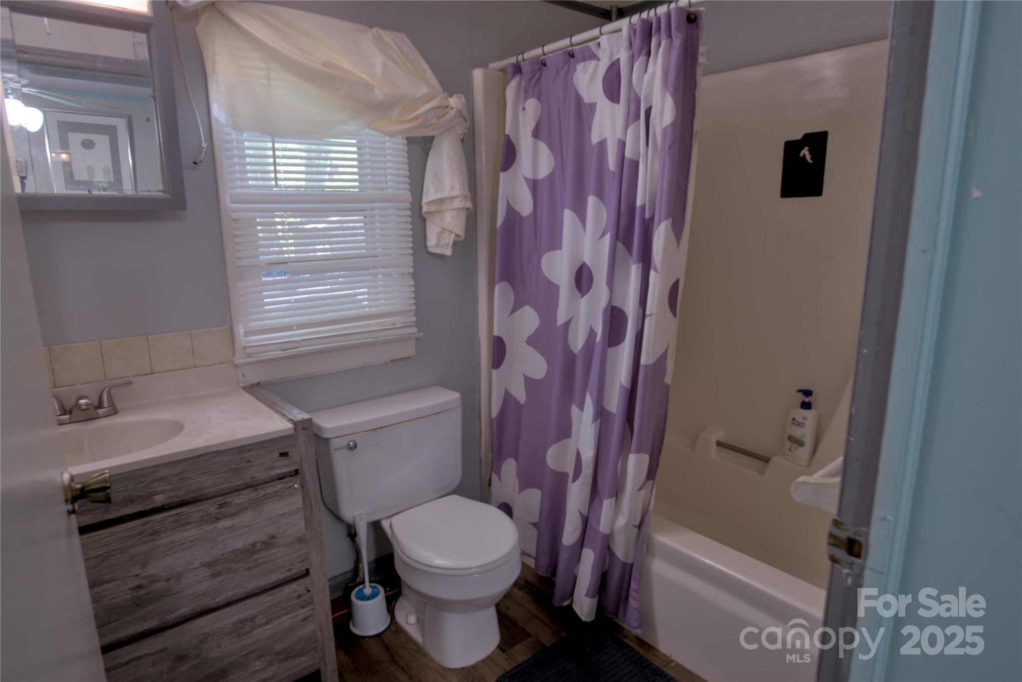 515 Upper Spencer Mountain Road Stanley, NC 28164 - Photo 17 of 24 a bathroom with a toilet and a shower
