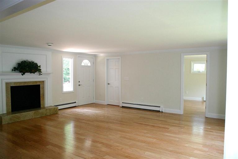 38 Leonard Road Hyannis, MA 02601 - Photo 15 of 35 a view of an empty room with wooden floor and a window