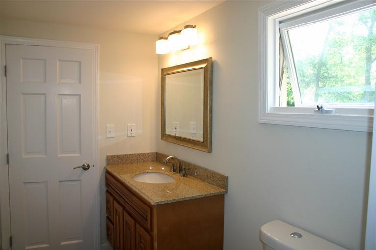 38 Leonard Road Hyannis, MA 02601 - Photo 24 of 35 a bathroom with a sink toilet and mirror