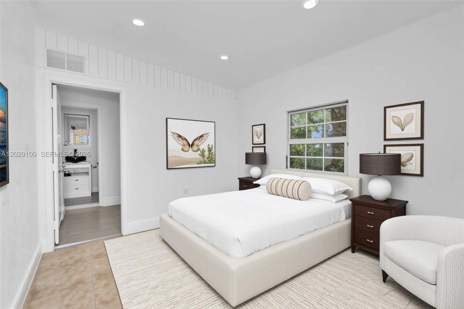 11790 Southwest 34th Street Miami, FL 33175 - Photo 37 of 56 a bedroom with a large bed and a couch