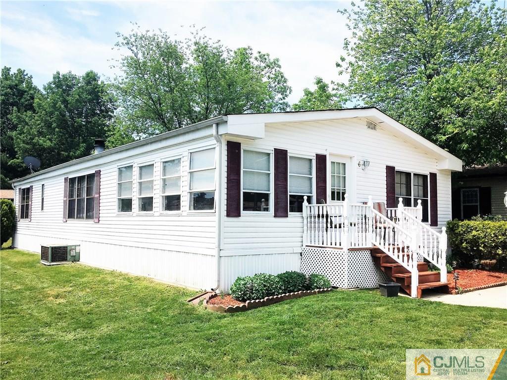 6 Byron Road, Unit 6 North Brunswick, NJ 08902 - Photo 1 of 25 a view of house with a yard