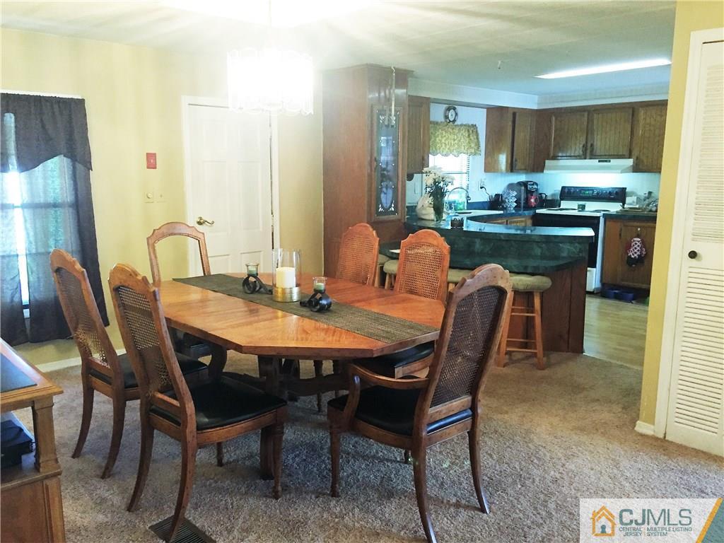 6 Byron Road, Unit 6 North Brunswick, NJ 08902 - Photo 14 of 25 a dining room with furniture and window