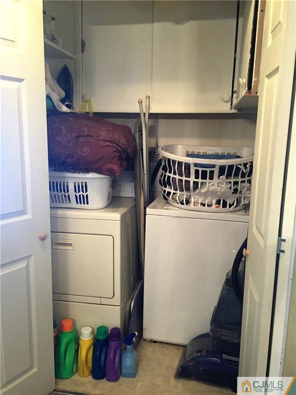 6 Byron Road, Unit 6 North Brunswick, NJ 08902 - Photo 23 of 25 a utility room with dryer and washer