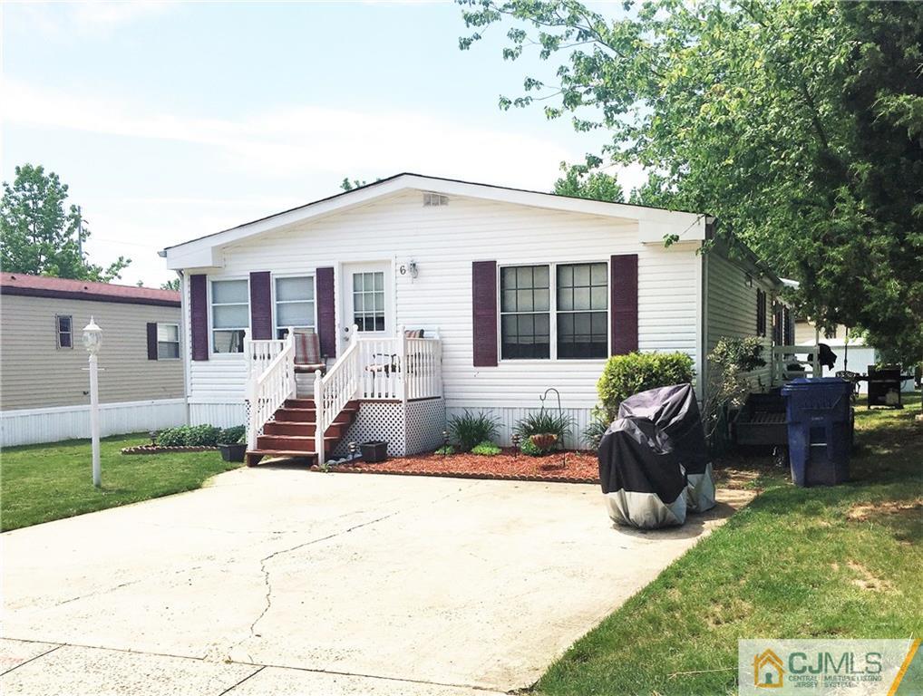 6 Byron Road, Unit 6 North Brunswick, NJ 08902 - Photo 4 of 25 a front view of a house with a patio