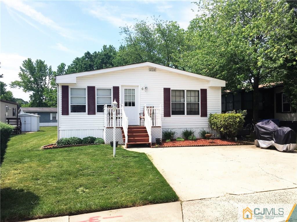 6 Byron Road, Unit 6 North Brunswick, NJ 08902 - Photo 5 of 25 a front view of house with yard and green space