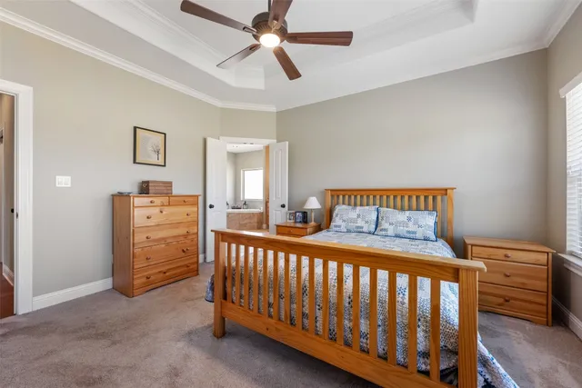 a spacious bathroom with a sink a mirror and bathtub
