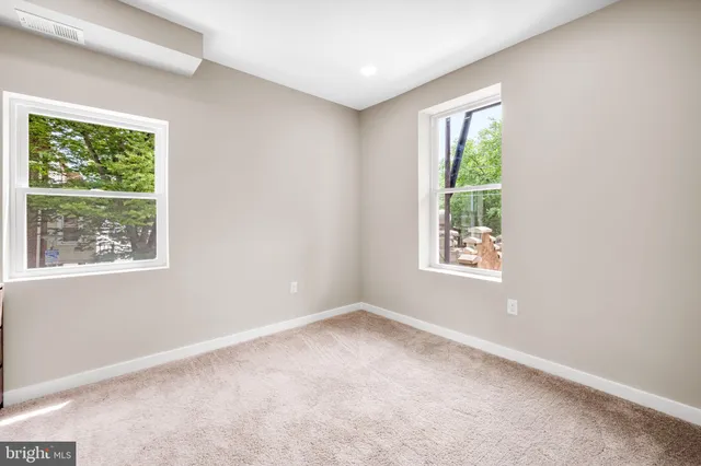 an empty room with windows