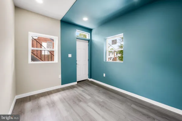 an empty room with windows