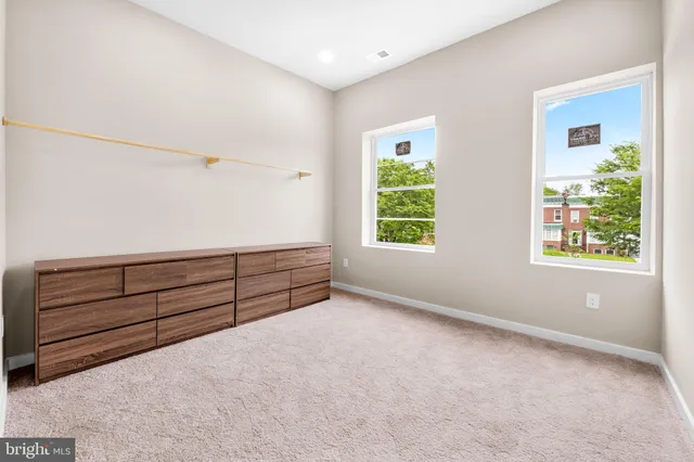 a room with furniture and a window