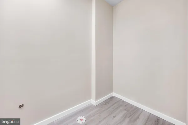 a view of small space with wooden floor