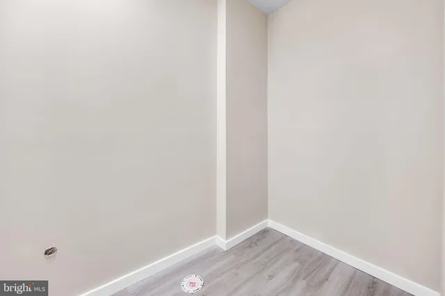 a view of small space with wooden floor