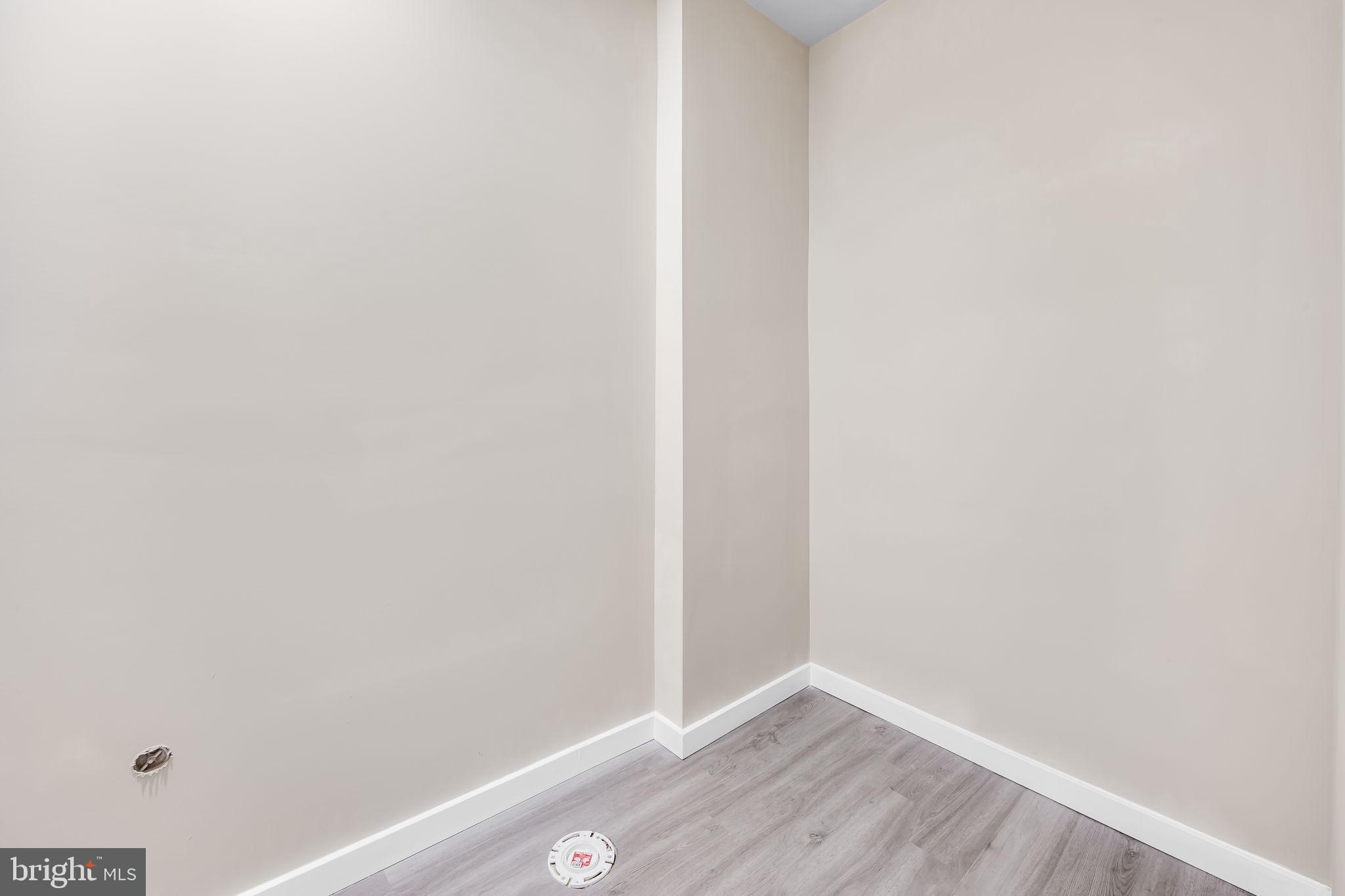 815 East 33rd Street Baltimore, MD 21218 - Photo 29 of 41 a view of small space with wooden floor