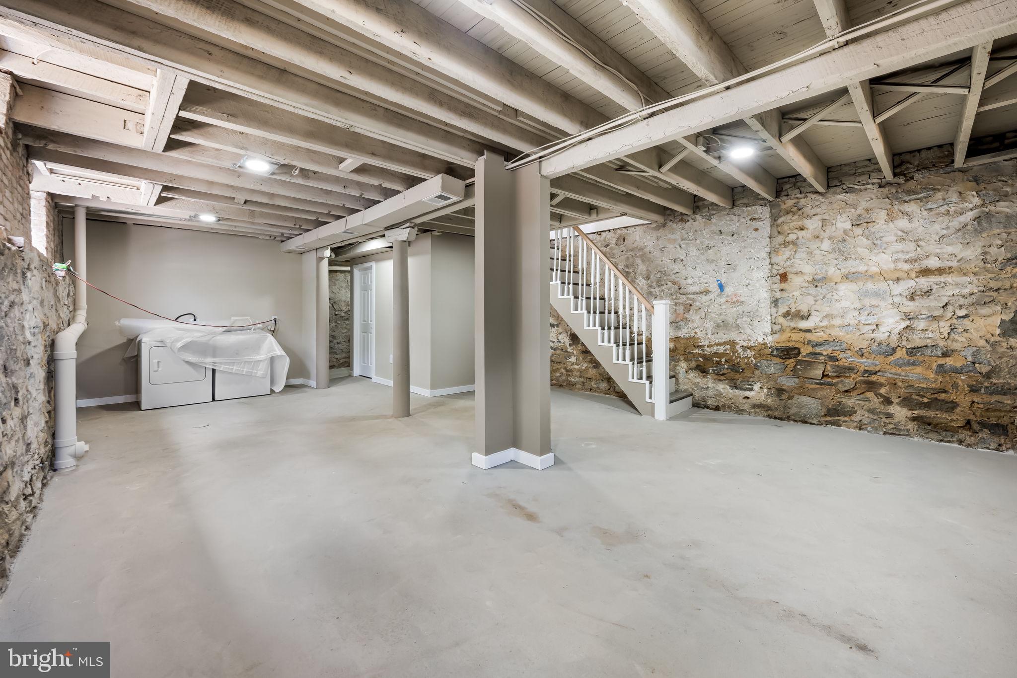 815 East 33rd Street Baltimore, MD 21218 - Photo 38 of 41 a view of an empty room with windows