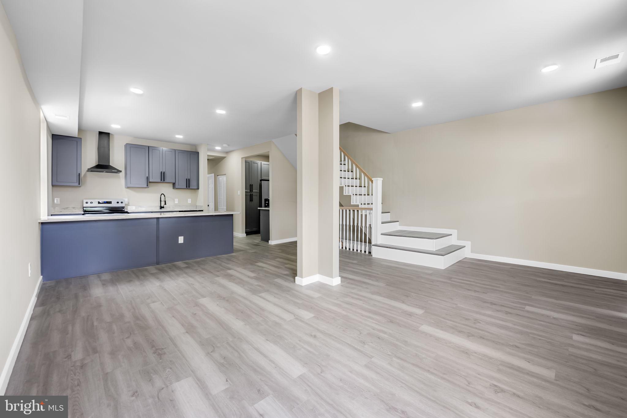 815 East 33rd Street Baltimore, MD 21218 - Photo 7 of 41 a view of kitchen and wooden floor