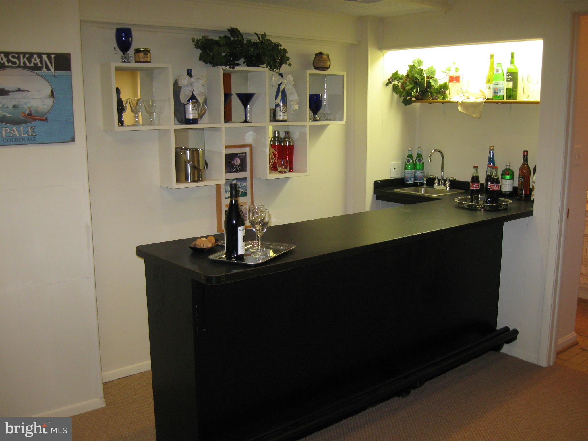 1700 Chester Mill Road Silver Spring, MD 20906 - Photo 25 of 30 Built-in wet bar in basement