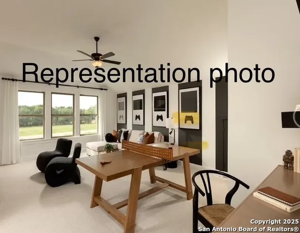 a view of a tables and chairs in a room