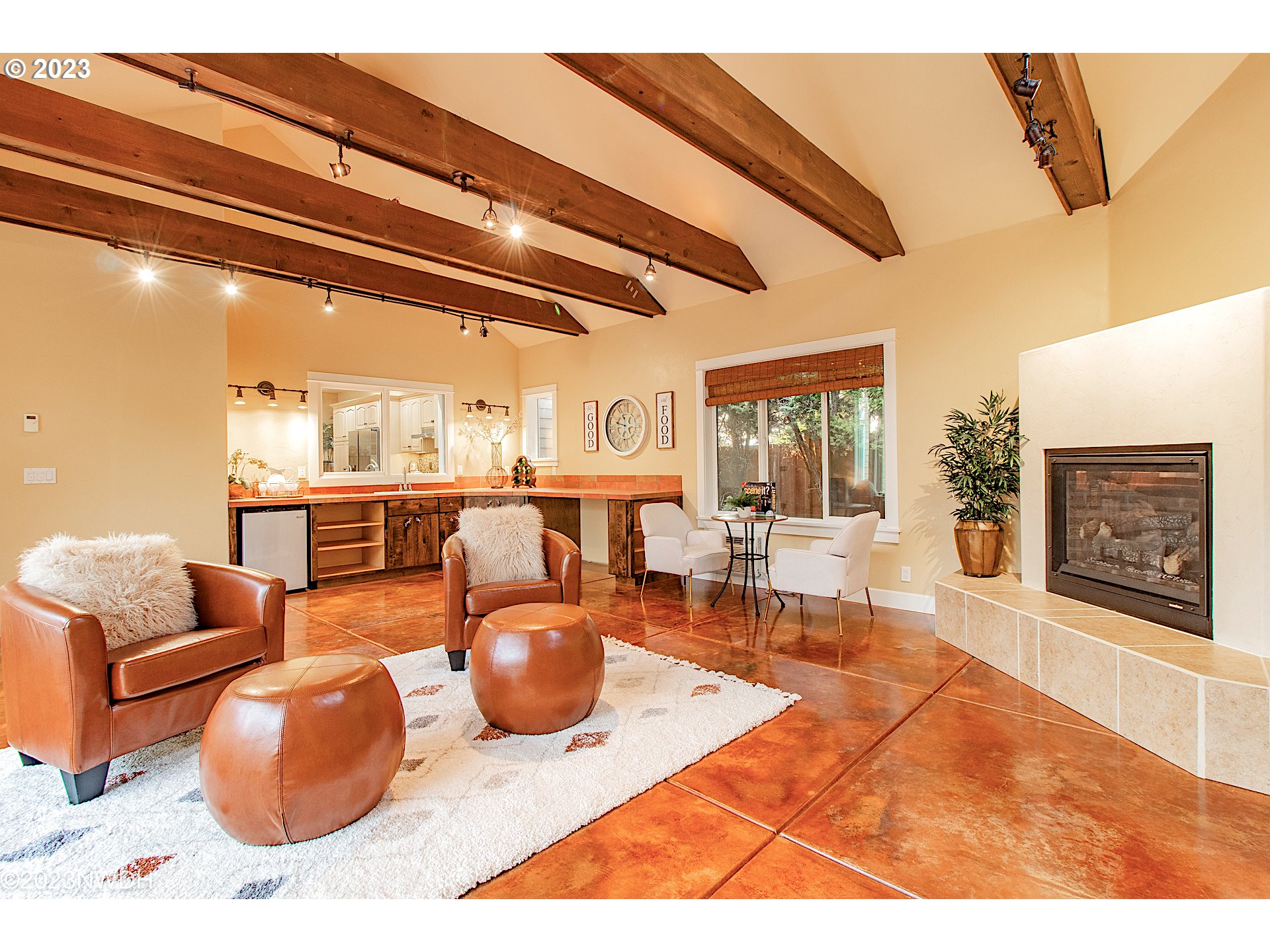 2983 Grand Cayman Drive Eugene, OR 97408 - Photo 21 of 43 a living room with furniture and a floor to ceiling window