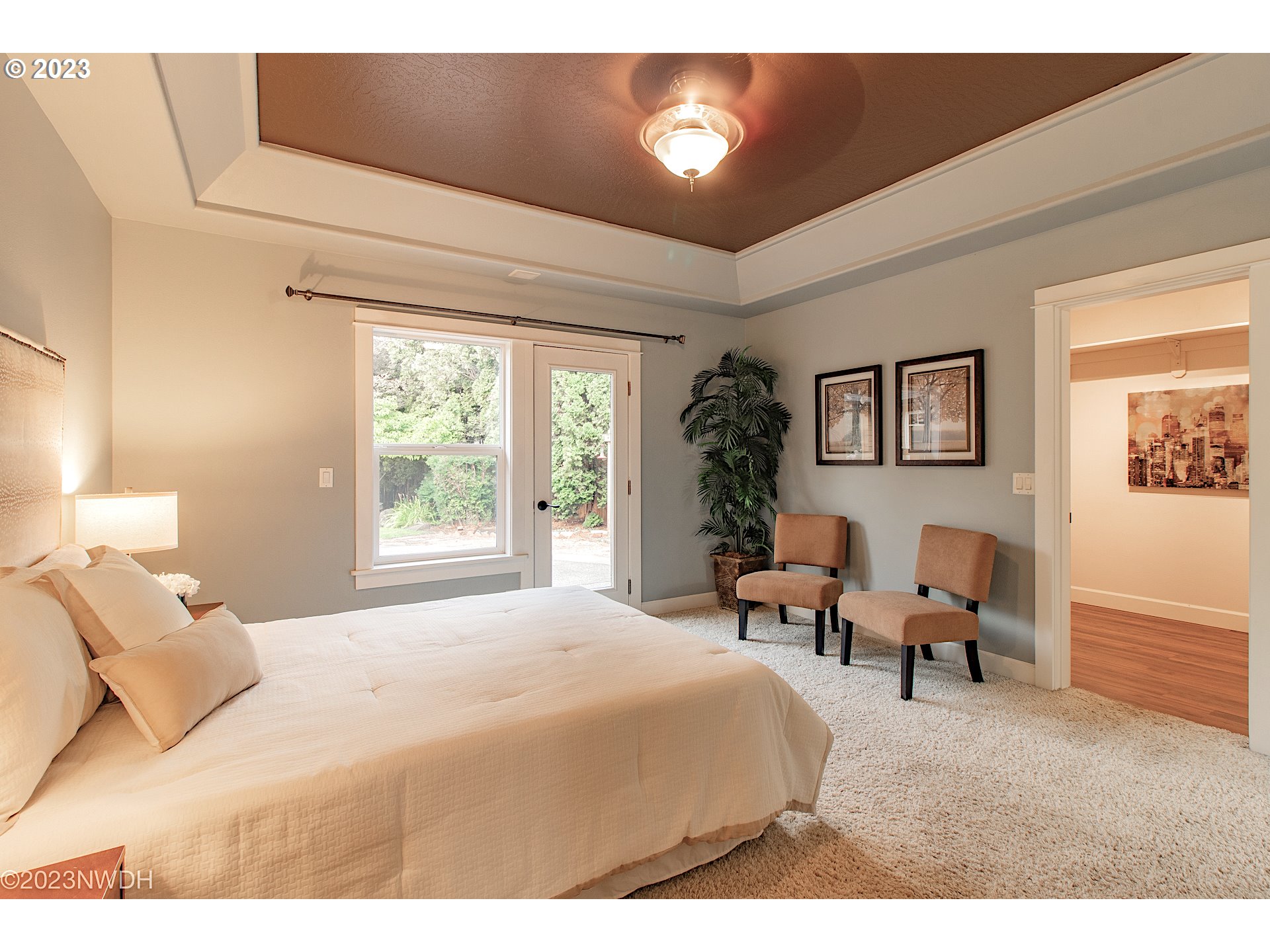 2983 Grand Cayman Drive Eugene, OR 97408 - Photo 24 of 43 a bedroom with a bed and a chair