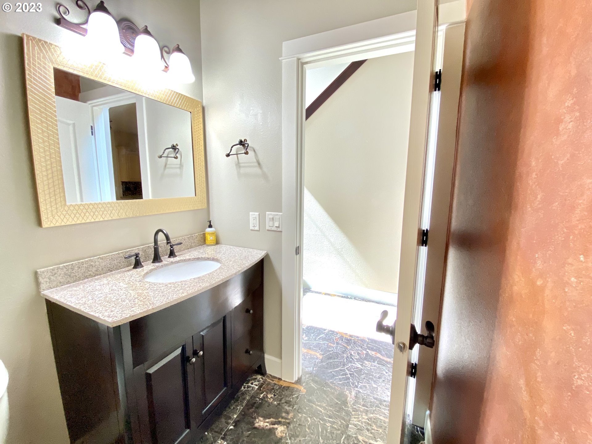2983 Grand Cayman Drive Eugene, OR 97408 - Photo 33 of 43 a bathroom with a sink and a mirror