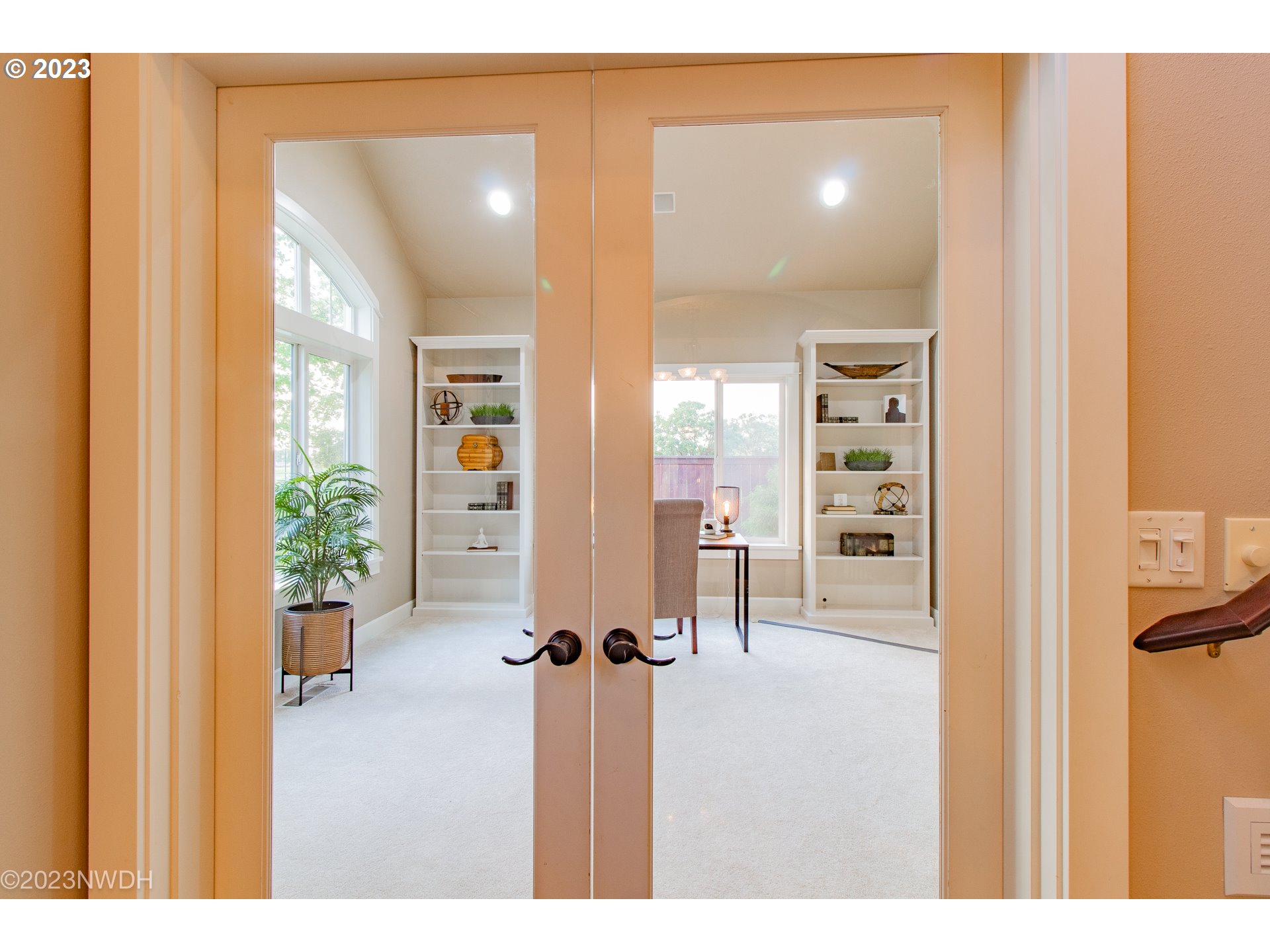 2983 Grand Cayman Drive Eugene, OR 97408 - Photo 10 of 43 a view of a hallway with furniture and a living room