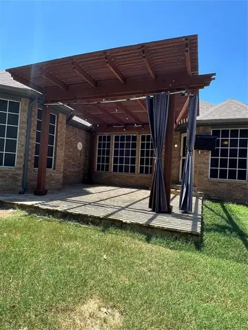 a bathroom with a toilet a sink a mirror and bathtub