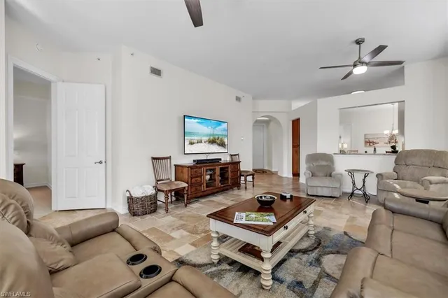 a kitchen with a sink stove and microwave