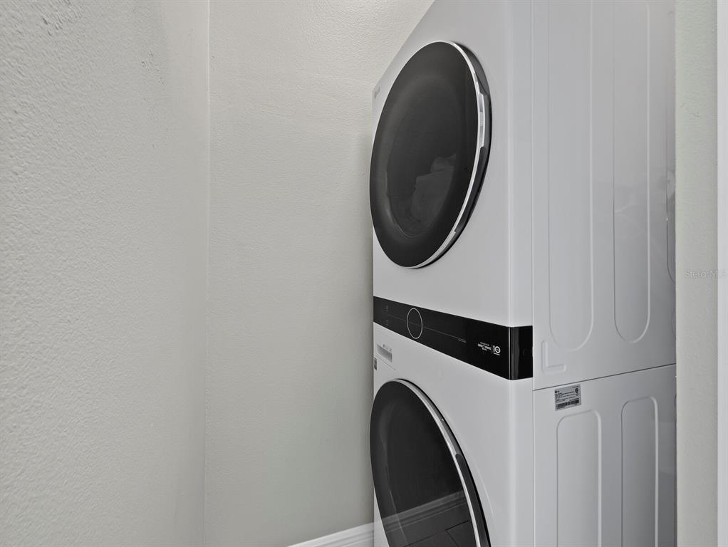 200 Cocoanut Avenue, Unit 7 Sarasota, FL 34236 - Photo 46 of 63 a close up view of a washer and dryer