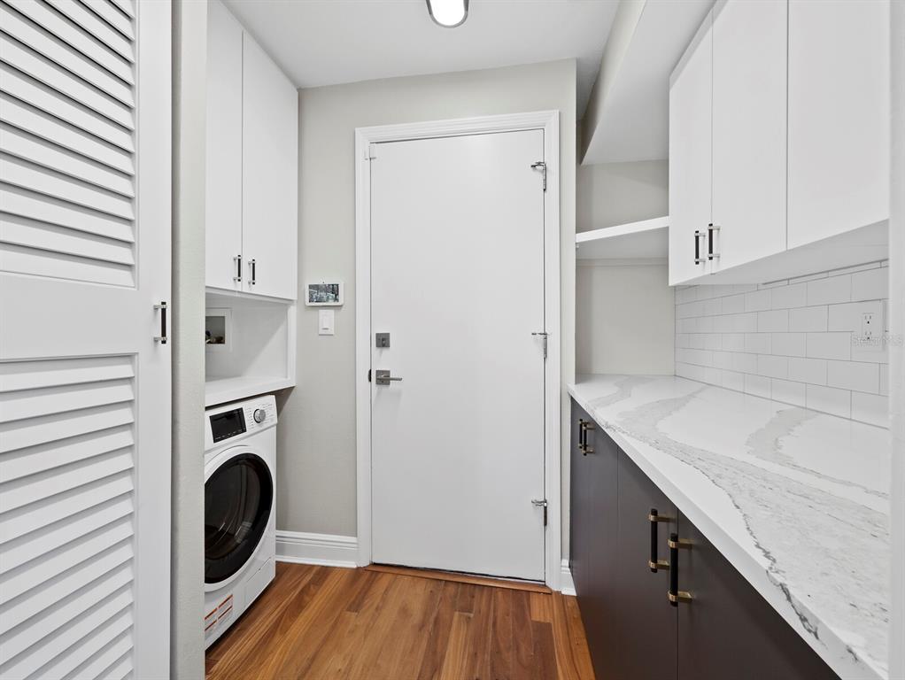 200 Cocoanut Avenue, Unit 7 Sarasota, FL 34236 - Photo 50 of 63 a view of kitchen and utility room