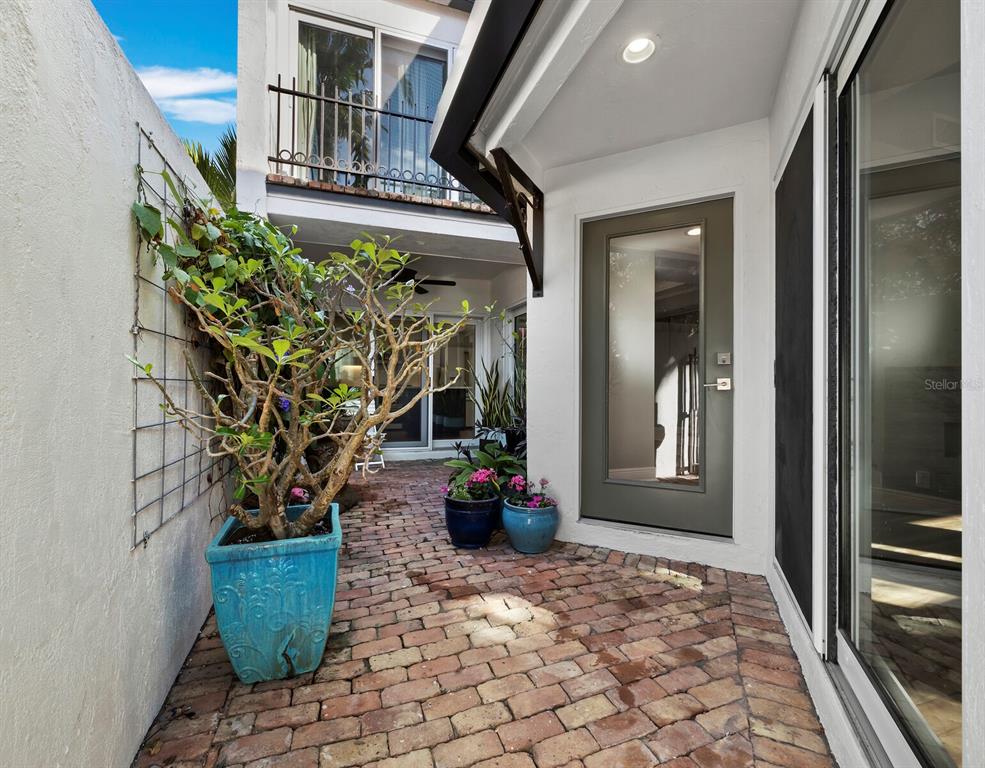 200 Cocoanut Avenue, Unit 7 Sarasota, FL 34236 - Photo 8 of 63 a view of a entryway door of the house