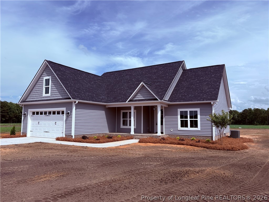 1075 Purdie-Hall Road Tar Heel, NC 28392 - Photo 27 of 28 a front view of a house with yard