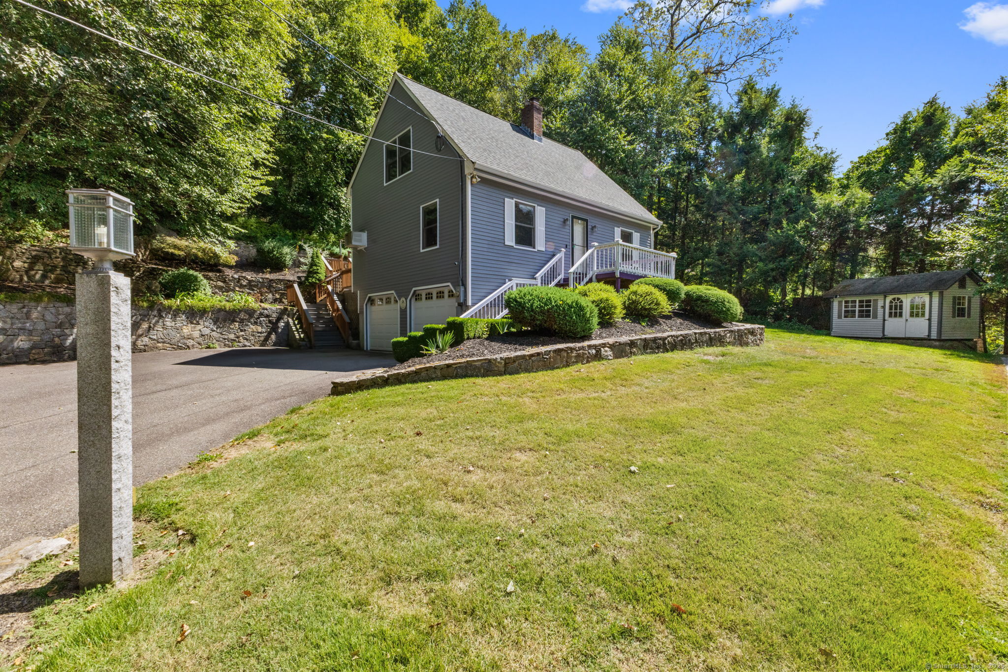 113 Squantuck Road Seymour, CT 06483 - Photo 1 of 1 a view of a house with backyard and tree